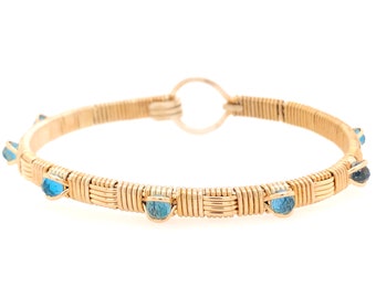 London Blue Topaz Wire Wrap Bracelet Argentium Silver and 14 karat yellow gold filled woven bracelet design by Ryan Eure Design
