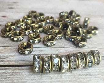 6mm AAA grade clear rhinestone crystal rondelle brass spacer, straight edge, antique bronze tone brass, six crystals, 20 pieces