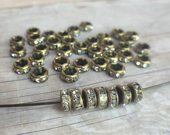 5mm AAA grade clear rhinestone crystal rondelle brass spacer, straight edge, antique bronze tone brass, six crystals, 20 pieces