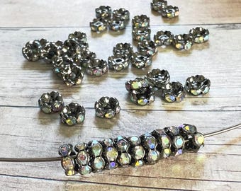 Rare 6mm AAA grade rhinestone crystals AB rondelle brass spacer, wavy edge, gun metal color brass, six crystals, 20 pieces