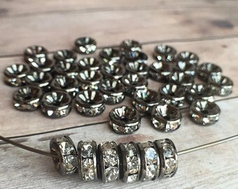 8mm AAA grade clear rhinestone crystals rondelle brass spacer, straight edge, gun metal color brass, six crystals, 20 pieces