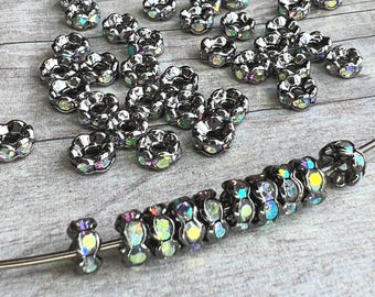 Rare 5mm AAA grade rhinestone crystals AB rondelle brass spacer, wavy edge, gun metal color brass, six crystals, 20 pieces