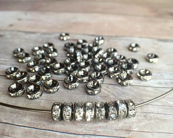 5mm AAA grade clear rhinestone crystals rondelle brass spacer, straight edge, gun metal color brass, six crystals, 20 pieces
