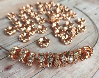8mm AAA grade clear rhinestone crystal rondelle brass spacer, dark rose gold tone spacer, wavy edge, six crystals, 20 pieces
