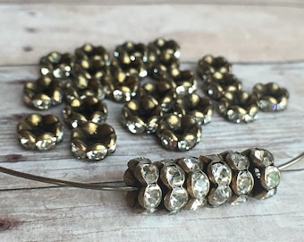 8mm AAA grade clear rhinestone crystal rondelle brass spacer, antique bronze tone spacer, wavy edge, six crystals, 20 pieces
