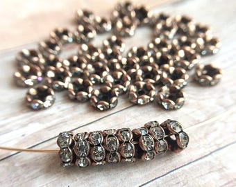 7mm AAA grade clear rhinestone crystal rondelle brass spacer, antique copper tone spacer, wavy edge, six crystals, 20 pieces