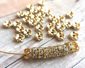 6mm AAA grade clear rhinestone crystal rondelle brass spacer, light gold tone spacer, wavy edge, six crystals, 20 pieces