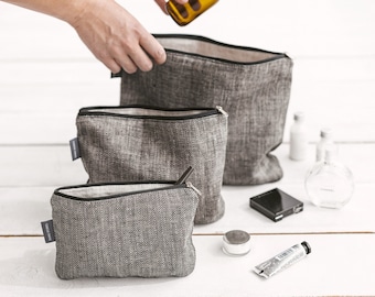 Set of 3 black linen toiletry bags for travel, wedding makeup and cosmetic. Natural linen zipper pouch for women, men. 3 sizes, colors