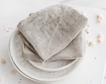 Set of natural linen waffle tea towels for kitchen. Organic open weave linen dish cloths for farmhouse. Soft hand towels as new home gift