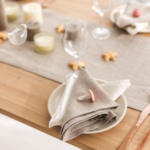 Thing Stories natural linen table runner – perfect for elegant yet simple tablescapes at a rustic wedding, Christmas dinner, or Thanksgiving celebration. This eco-friendly runner also suits birthday parties and Mother's Day events, adding charm to any seasonal or holiday setting.
