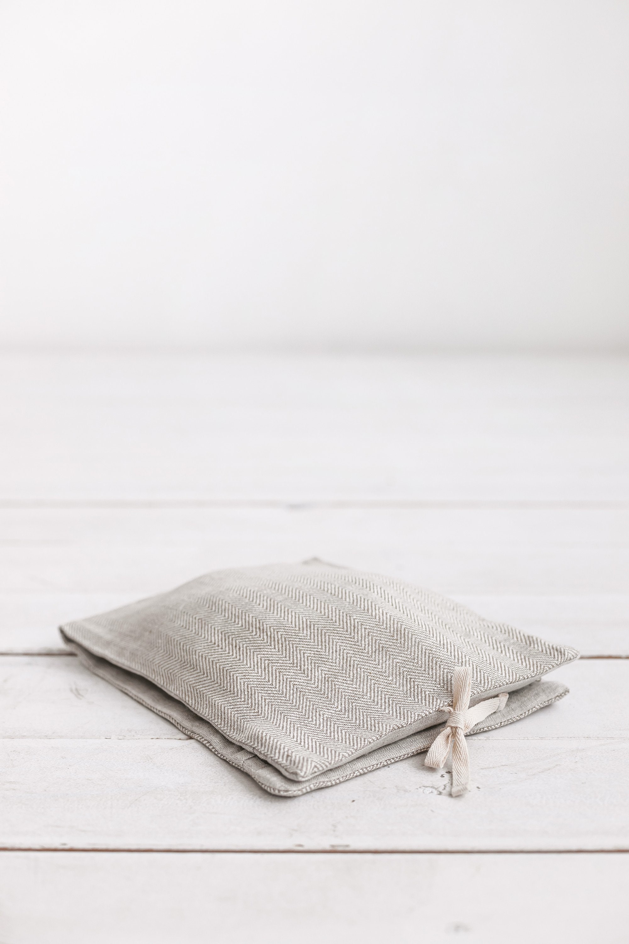 White linen travel bag with zipper for lingerie, clean and dirty laundry. Modern beige travel bag for women, men. Perfect gift, 3 colors