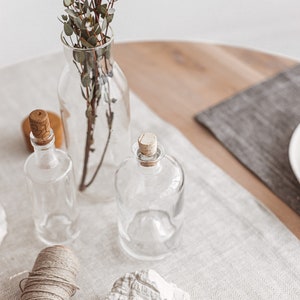 Elegant natural linen table runner in white herringbone, ideal for rustic wedding receptions, Christmas and Thanksgiving Day gatherings, or everyday dining. A soft, minimalist accent that brings warmth and charm to any holiday dinner or celebration. Thoughtfully handmade by Thing Stories.