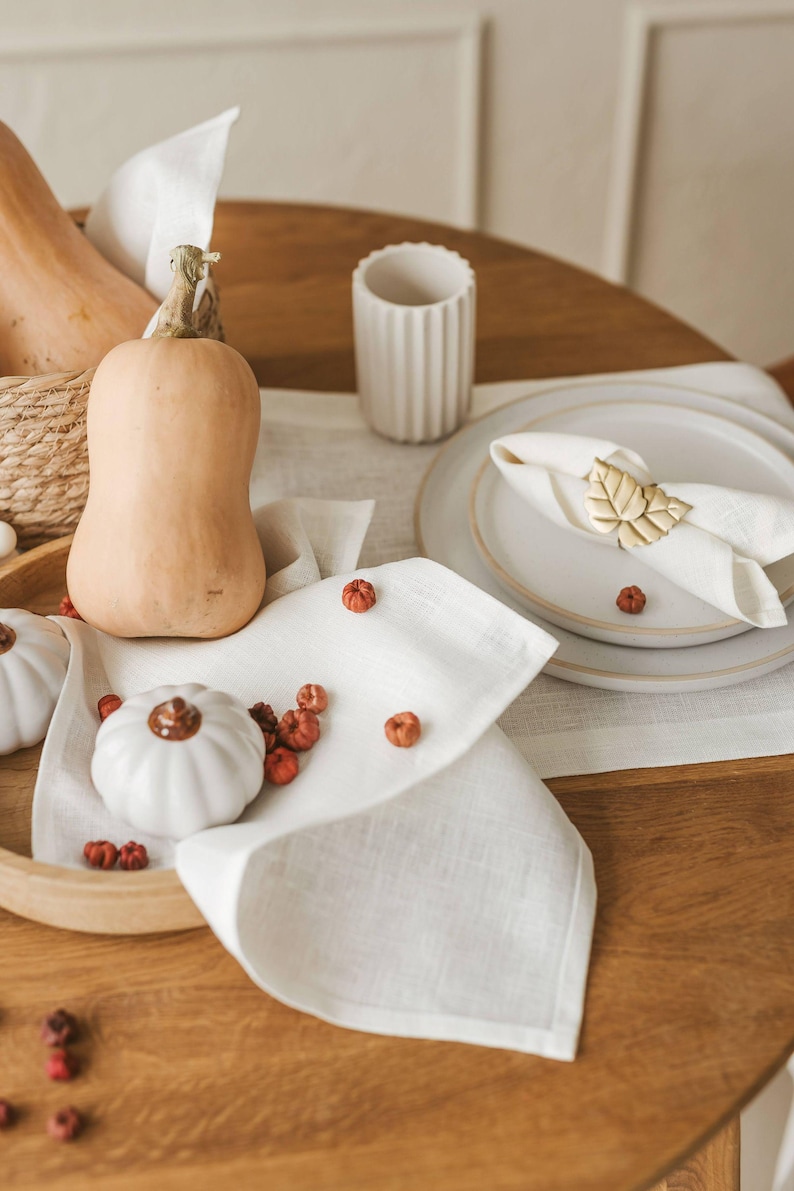 This elegant white linen table runner makes a perfect housewarming gift or timeless addition to a modern, minimalist kitchen or dining room.