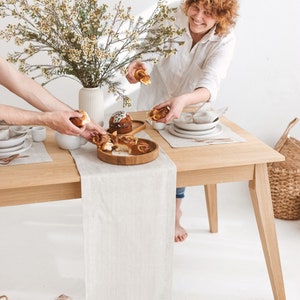 Elegant natural linen table runner in white herringbone, ideal for rustic wedding receptions, Christmas and Thanksgiving Day gatherings, or everyday dining. A soft, minimalist accent that brings warmth and charm to any holiday dinner or celebration. Thoughtfully handmade by Thing Stories.