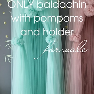 May include: Two tulle canopy bed canopies with pom poms and holders. One canopy is light blue and the other is pink. The text "ONLY baldaquin with pompoms and holder For sale" is visible in the image.