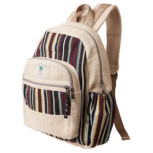 May include: A beige hemp backpack with a black, red and yellow striped pattern. The backpack has a large front pocket with a zipper and a smaller pocket on the side. The backpack has a hemp leaf logo with the text "Himalayan Hemp" and "Nepal Handmade" on the front pocket.