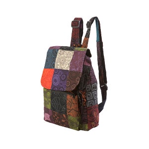 May include: A colourful patchwork backpack with a flap and adjustable straps. The bag is made from squares of patterned fabric in red, orange, green, purple, and brown. It has a zipped front pocket and a top handle.