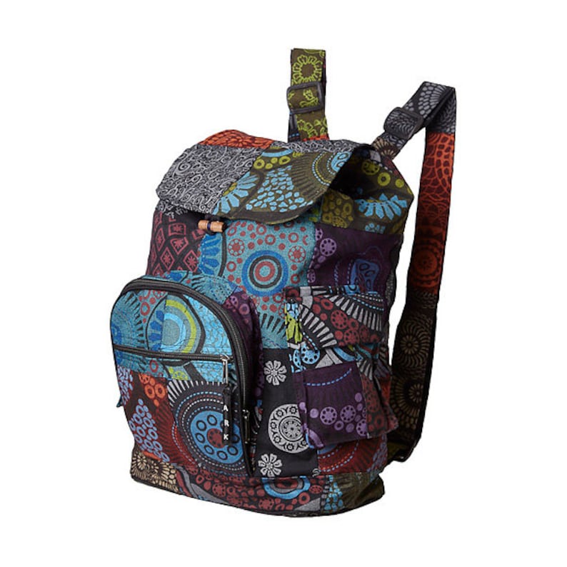 May include: A multi-coloured patchwork backpack with a large front pocket and a smaller zippered pocket. The backpack has a drawstring closure and adjustable straps.