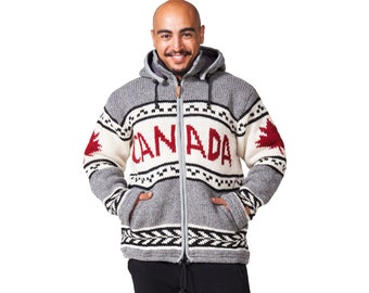 May include: A gray, white, and red hooded zip-up sweater with the word "CANADA" across the chest and a red maple leaf on the sleeve. The sweater has a black and white geometric pattern and two front pockets.