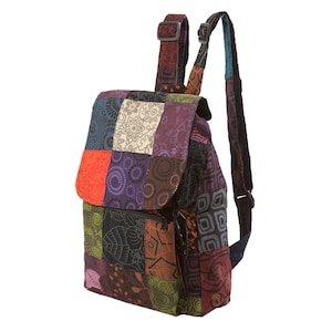 May include: A multi-coloured patchwork backpack with a zipped pocket and adjustable straps.