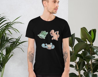 May include: A black t-shirt with a graphic print of three cartoon characters. The characters are green, orange, and blue. The characters are from the popular video game and anime series Pokemon.