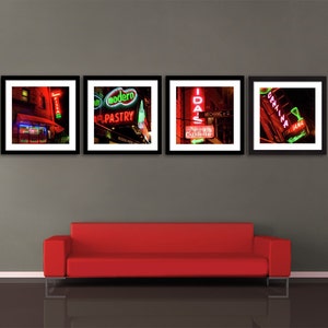 May include: Four framed photographs of neon signs in a city at night. The signs advertise a pastry shop, an Italian restaurant, a restaurant called "Idals", and a restaurant called "Orlina".
