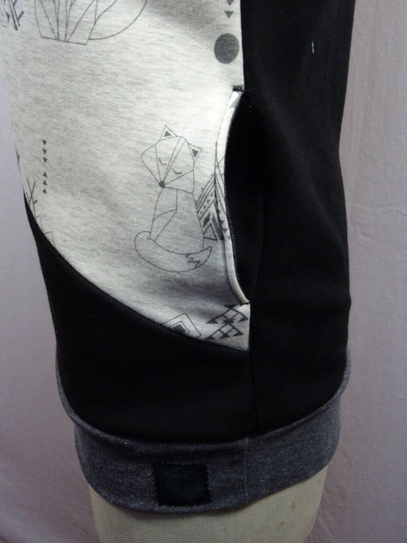 Original woman with big collar and foxes origami motif sweater