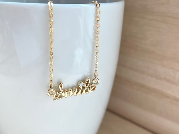 gold smile necklace