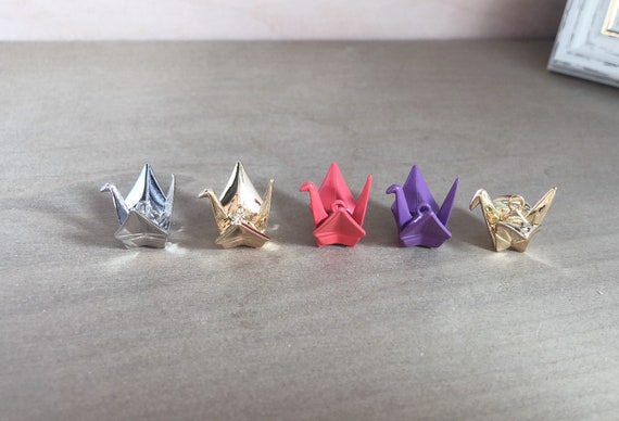 Origami store crane charm