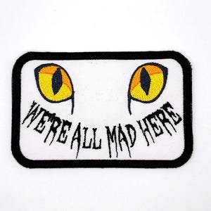 Cat Eye-We&#39;re All Mad Here Iron On Patch Embroidered Fabric Wonderland Patch