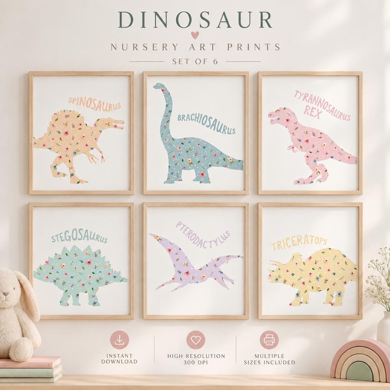 May include: A set of six square art prints featuring floral-patterned dinosaurs including a Spinosaurus, Brachiosaurus, Tyrannosaurus Rex, Stegosaurus, Pterodactylus, and Triceratops, each labeled with its name in a light-colored sans-serif font.