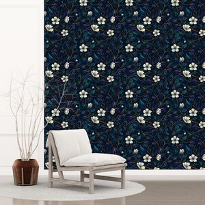 Immerse yourself in the beauty of nature with our Dark Botanical Peel and Stick Wallpaper. Featuring a secret garden of wildflowers, this maximalist accent wall decor brings a vibrant and lush feel to your space.