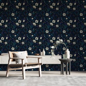 Immerse yourself in the beauty of nature with our Dark Botanical Peel and Stick Wallpaper. Featuring a secret garden of wildflowers, this maximalist accent wall decor brings a vibrant and lush feel to your space.