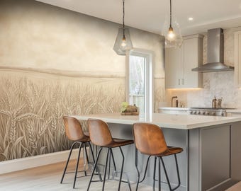 Puede incluir: Una cocina moderna con un papel tapiz marrón claro que presenta un campo de trigo. La cocina tiene una isla de encimera blanca con tres taburetes de bar de cuero marrón y dos lámparas colgantes.
