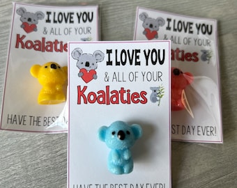 May include: Three cards with the text "I love you & all of your Koalaties" and a small koala figurine on each card. The koala figurines are yellow, blue, and red.