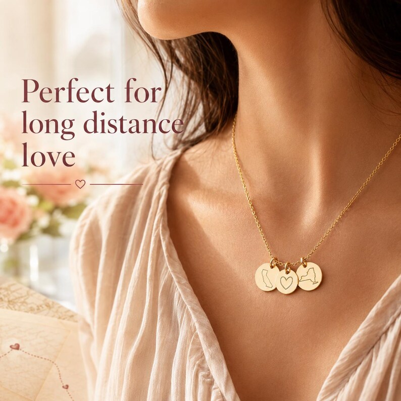 Long-distance love necklace worn by model with custom state charms and heart pendant.