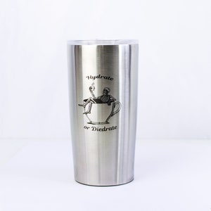 A stainless steel engraved coffee tumbler on a white background. Personalized insulated thermos, large coffe tumbler, personalized travel mug, large customized travel coffee mug, hot and cold drink thermos, drink thermos winter, drink thermos summer
