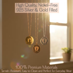 Three round baby footprint necklaces in gold, rose gold, and silver hanging in warm sunlight near a window, each engraved with tiny footprints and personalized text.