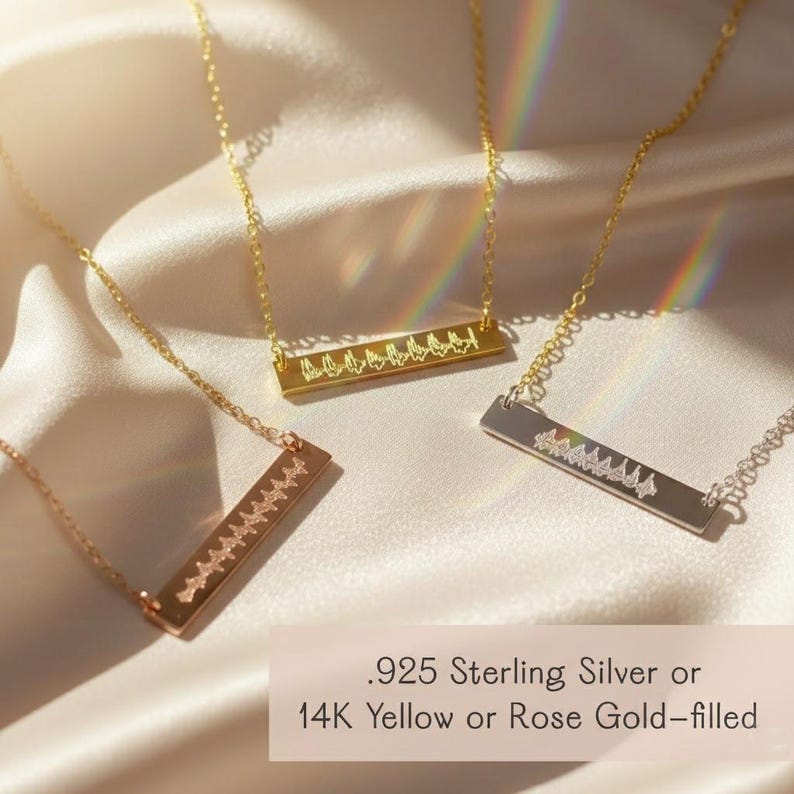 Heartbeat bar necklaces in sterling silver, yellow gold filled, and rose gold filled, engraved with custom sound wave or baby heartbeat design. Personalized memorial or pregnancy keepsake jewelry, meaningful gift for moms, push present, miscarriage remembrance, or baby shower.