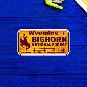 Bighorn National Forest License Plate Wyoming Rusted Sticker 4&quot;