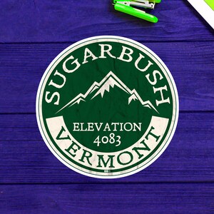 May include: A green and white round sticker with the text "Sugarbush Vermont" and "Elevation 4083" with a mountain range graphic.