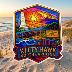 May include: A sticker featuring a stained-glass style illustration of Kitty Hawk, North Carolina. It depicts the Wright Brothers monument with the text THE FIRST FLIGHT, a hang glider, a wooden boardwalk, and a sign reading KITTY HAWK WOODS COASTAL RESERVE.