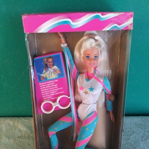 Barbie gimnasta articulada hot sale