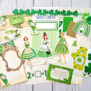 May include: A collection of St. Patrick's Day themed ephemera, including vintage paper cutouts of leprechauns, women in green dresses, and a Care Bear. Green shamrock stickers, a teacup, and a guest check are also visible.