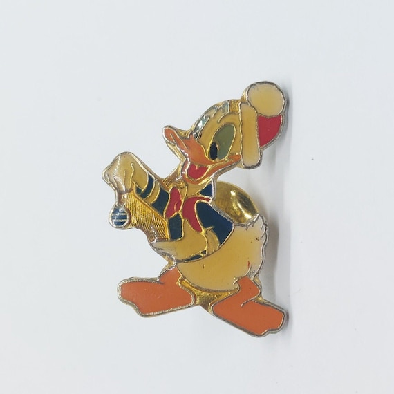 Vintage Disney Donald Duck Holding Christmas Ornament Pin Lapel Enamel