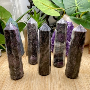 Garnet in Astrophyllite tower point obelisk