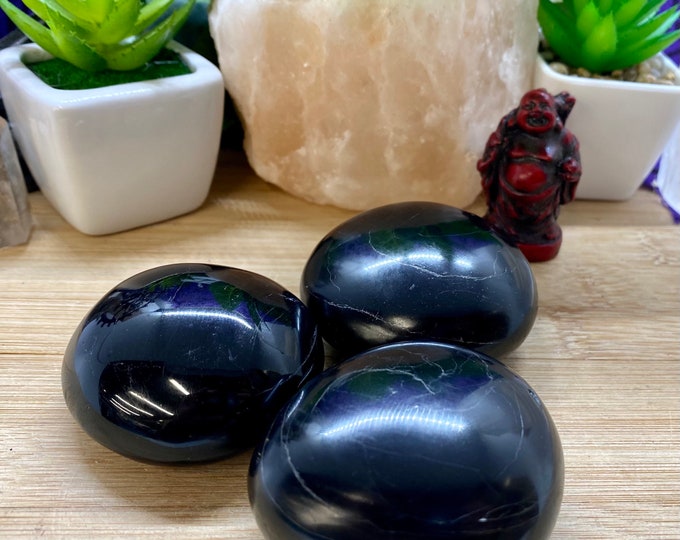 Obsidian crystal palm stone