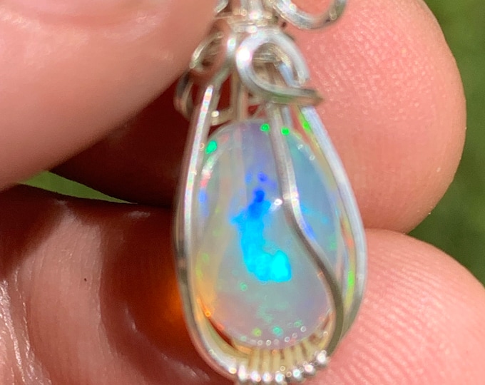 Stunning Ethiopian Opal Pendant wrapped in Silver EOSP01 SME24