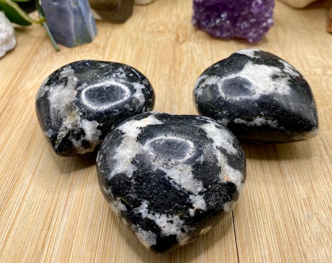 Medium black tourmaline in Quartz heart SME24