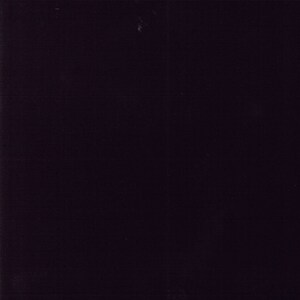 May include: A solid black background with no visible objects or text.